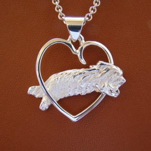 Sterling Silver Bearded Collie Jumping Study Through A Free Form Heart Pendant