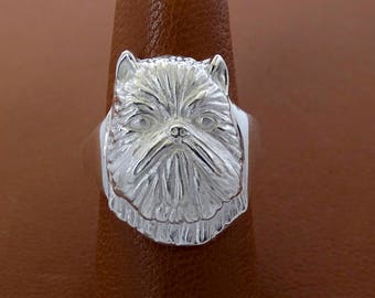 Anillo de estudio con cabeza de grifo de Bruselas de plata de ley