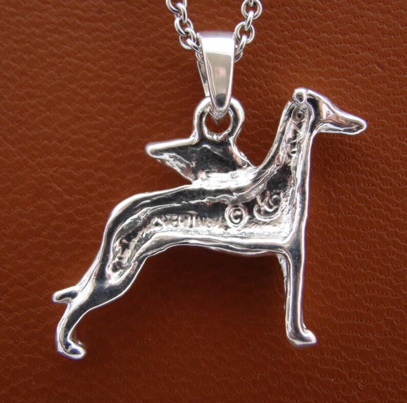 silver whippet statue