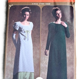 May include: Simplicity sewing pattern 4055 featuring two women in long dresses. The pattern is for sizes 14, 16, 18, and 20. The text "CIRCA 1795-1825" is printed on the pattern. The Simplicity logo is visible.