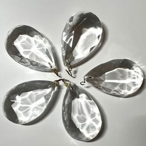 Vintage/Antique Crystal Chandelier Prisms! 16 available 2 in. x 1 1/2 in. Great as sun catchers, for fixing vintage lighting, or for crafts!