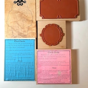 May include: A collection of wooden stamps with rubber designs, including an oval guide, a rectangle, a circle, and a mustache. The image also shows instructions for card making with the stamps.