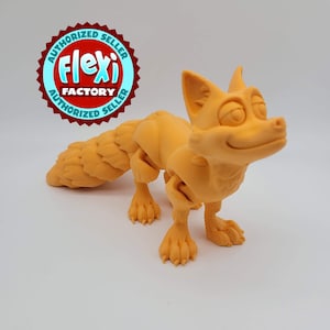 May include: A 3D printed orange fox figurine with a segmented tail. The figurine is posed standing with its head tilted to the side. The figurine is made by Flexi Factory.