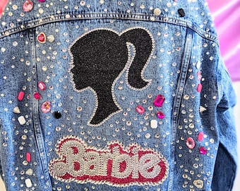 Barbie Silhouette with B on Front on a Med Blue Denim Jacket. Size L
