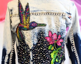 Humming Bird with Pink Flower on a bleached Denim Jacket. Size XS