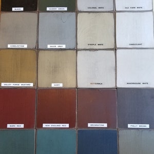 May include: A color chart with 18 different paint colors, each with a name. The colors include black, Quaker green, colonial white, old farm white, cobblestone, Salem gray, steeple white, candlelight, valley forge mustard, ivory, buttermilk, manorhouse white, barn red, new England red, brownstone, Philly brown, cupboard blue, Plymouth blue, village tavern blue, and antique pewter.
