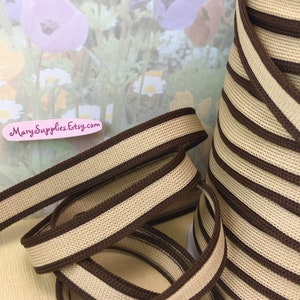 May include: Brown and beige striped elastic trim. The trim is approximately 1 inch wide.  MarySupplies.Etsy.com