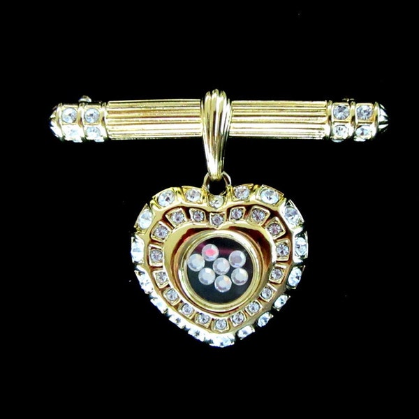 NOLAN MILLER gold tone ridged bar brooch or pendant with floating rhinestone heart - Hollywood Regency