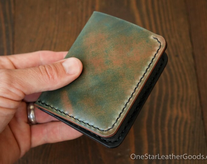 The Six Pocket Horizontal leather wallet - marbled Horween shell cordovan / black bridle