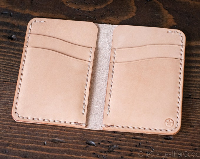 The Six Pocket Vertical leather wallet - natural skirting leather