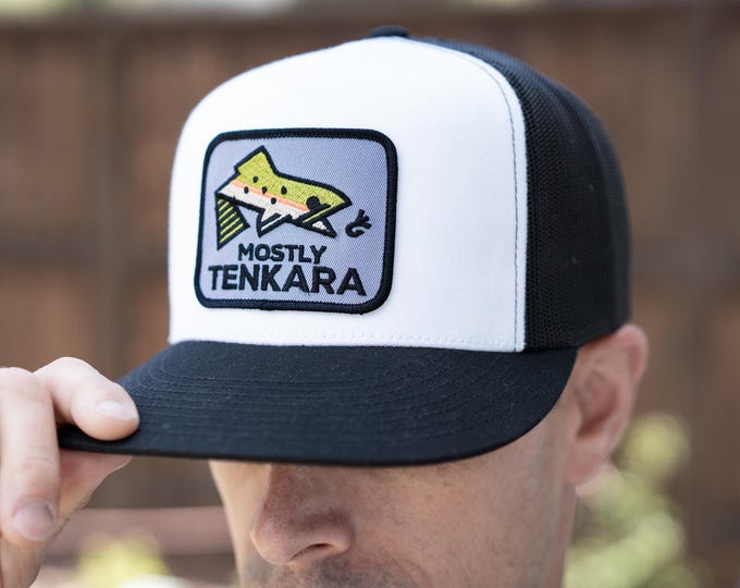 Trucker baseball hat with embroidered patch, rainbow or golden trout fly fishing logo