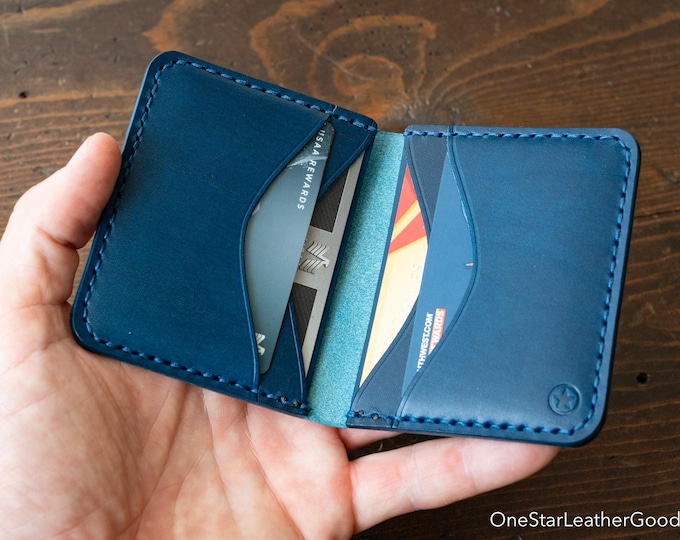 The Six Pocket Horizontal leather wallet - blue Buttero leather