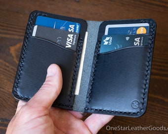 The Six Pocket Vertical leather wallet - black Buttero leather