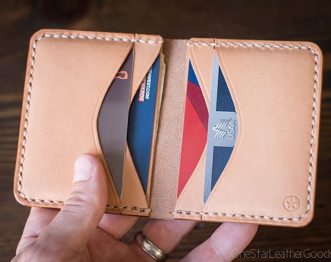 The Six Pocket Horizontal leather wallet - natural skirting leather