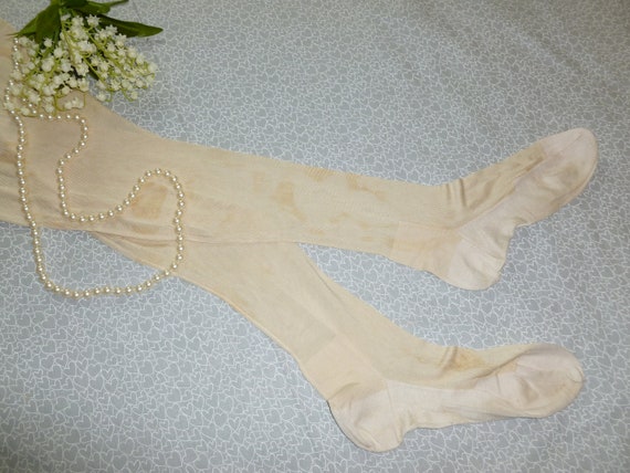 NOS Antique pair of Garter Stockings Off White Sea