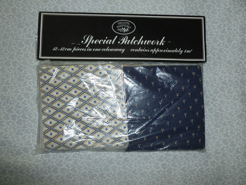 May include: Package of fabric scraps for patchwork quilting. It contains 12 - 2 inch pieces in one colourway and approximately 1 yard of fabric.