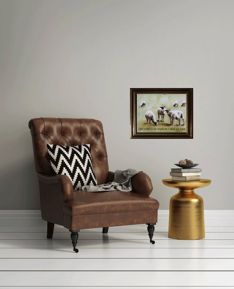 May include: A framed print featuring a watercolour painting of sheep in a field. The print has a gold frame and the text "The LORD is my shepherd; I shall not want." Psalm 23:1.