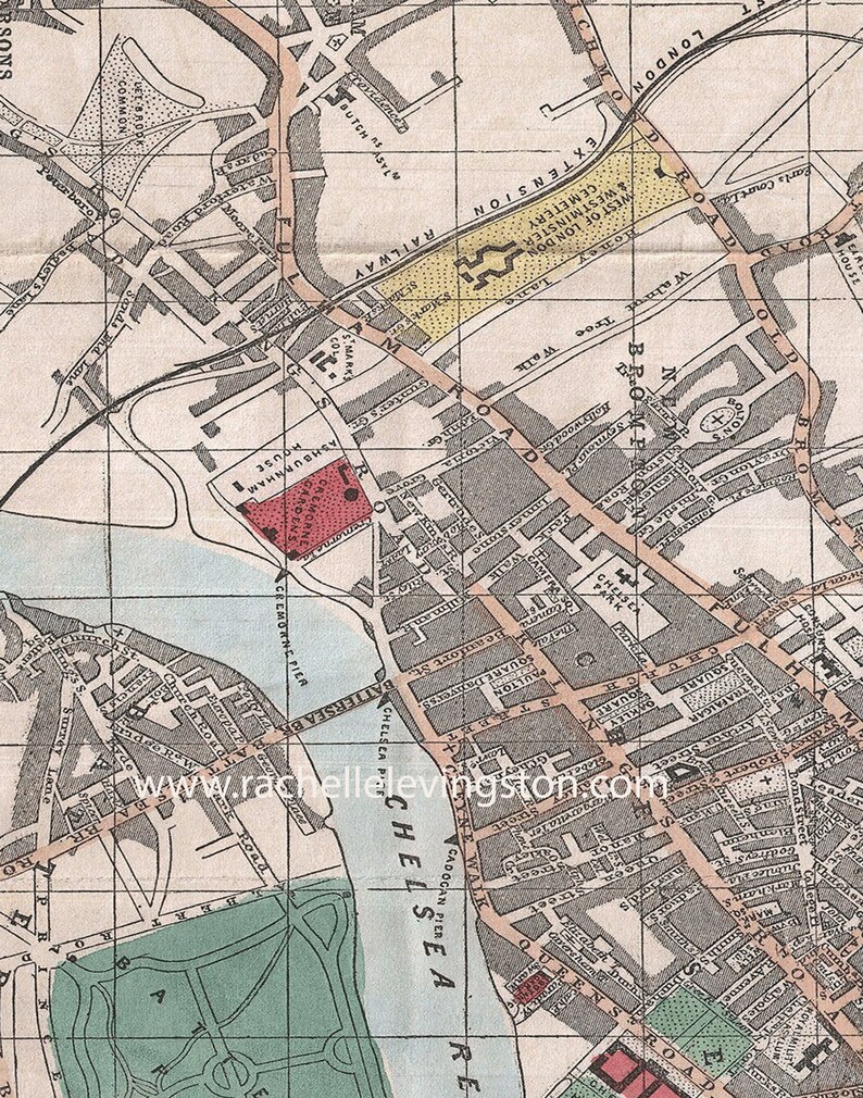 May include: A vintage map of London, England, showing the layout of streets and landmarks. The map is printed in black and white with red and yellow accents. The map includes the names of streets, parks, and other points of interest. The map is titled "London" and is dated 1890.