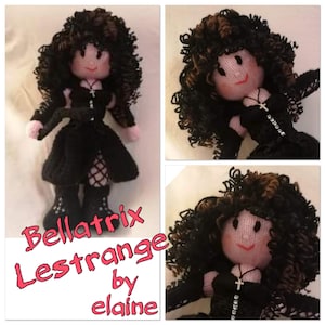 May include: A handmade doll with black curly hair, wearing a black dress, boots, and a cross necklace. The doll's name, "Bellatrix Lestrange," is written in pink text. The doll is a unique, handcrafted item.