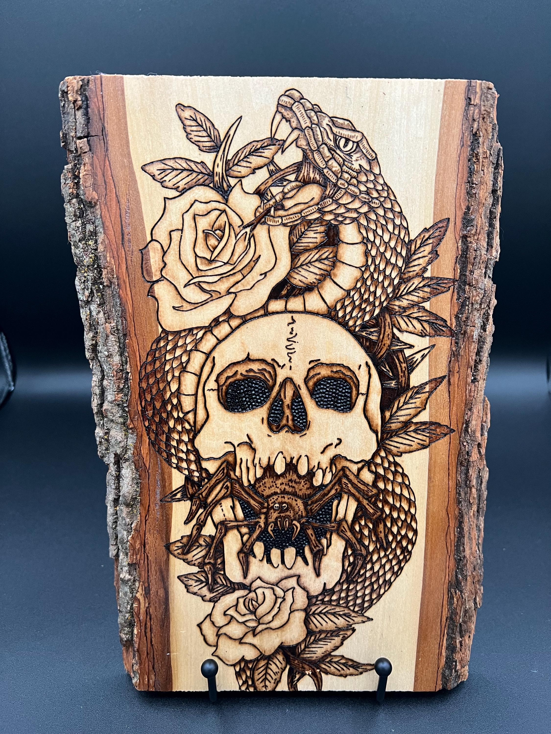 Skull and Snake Wood Burn. Done by hand.