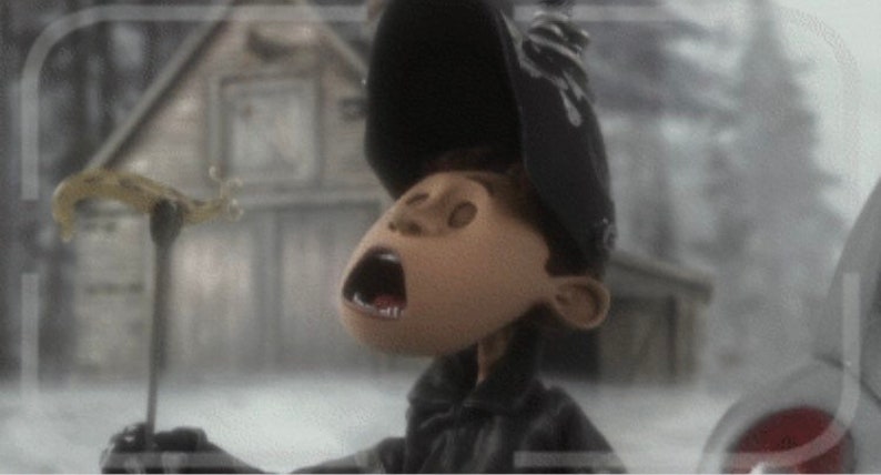 May include: A close-up of a character with a black hat and a wide open mouth, looking up in surprise. The character is holding a long, thin object in their hand.