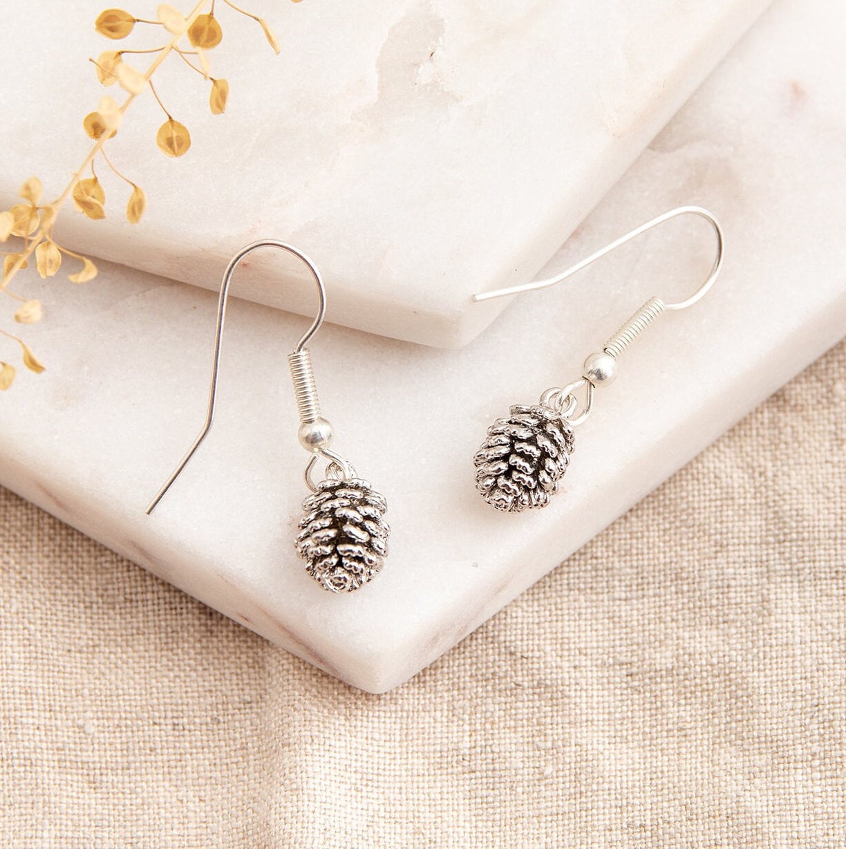 Silver pine store cone earrings
