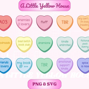 May include: A set of 12 heart-shaped candy conversation hearts with various phrases and colors. The hearts are arranged in three rows of four. The phrases include "A03", "enemies 2 lovers", "fluff", "TBR", "sry cant go, im busy (reading)", "goodreads", "bad betch book club", "dramione", "kindle unlimited", "fictional puck bunny", "friends 2 lovers", "my book BF >>>", "TBR", "emotional support kindle", and "spice is nice".