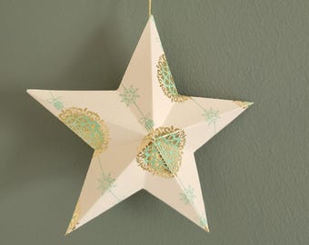 Gwiazda 3D z białego i złotego papieru dekoracyjnego, ręcznie robiona ozdoba świąteczna na choinkę