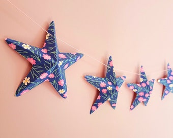 Pink and multicolored paper star garland with small flowers 130cm.