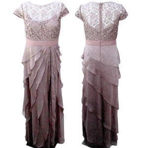 May include: A mauve lace and chiffon dress with a tiered skirt and short sleeves.