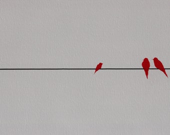 Familia de tres rojos