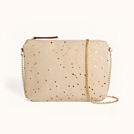 small beige clutch bag