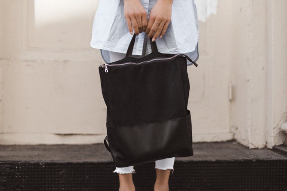 black leather backpack diaper bag