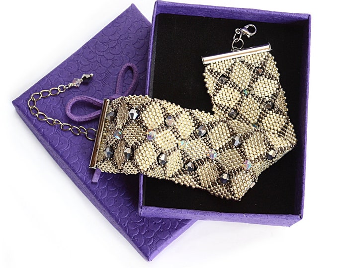 Swarovski crystals, braided bracelet, aluminum and nickel