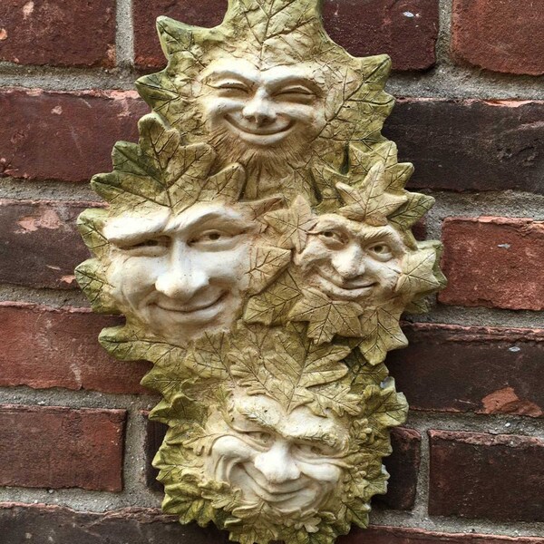 4 Green men wallhanging for home or garden, cast stone with loop on the back for hanging