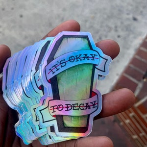 Su pegatina holográfica de vinilo Ok To Decay
