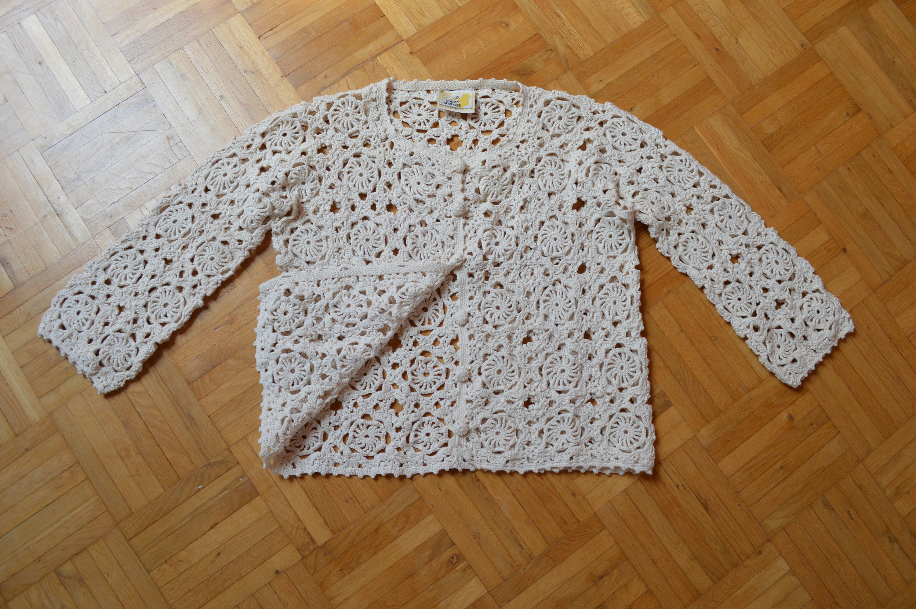 golden spiderweb knitwear