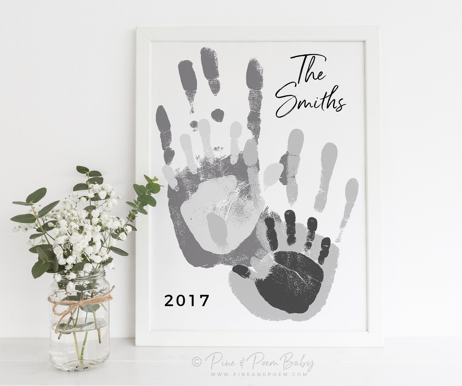 Картина с отпечатками рук пары