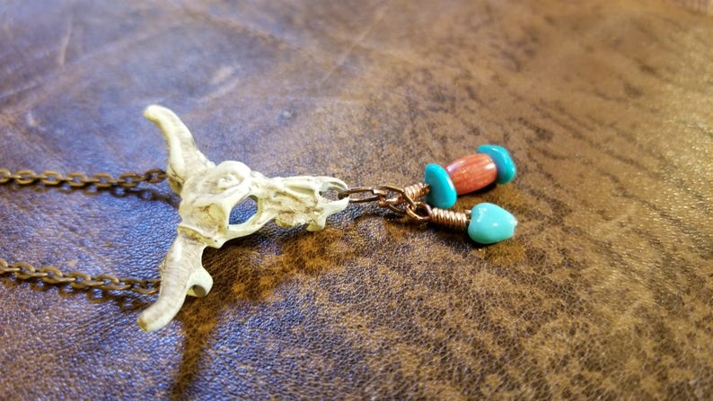 Southwest inspired hand painted cow skull and charms. image 1