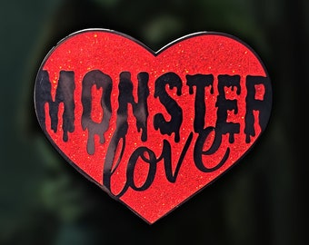 Pin de amor de monstruo