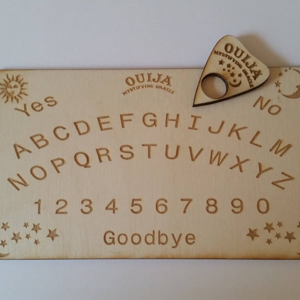 Mini travel ouija board with planchette