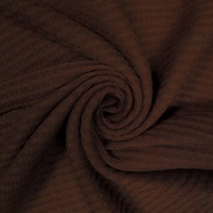 Tejido de punto cepillado con efecto gofrado de poliéster, rayón y elastano de 60" de ancho cortado a medida. (200 g/m²) Tejido de peso medio, transpirable. Chambray color ladrillo n.° 707