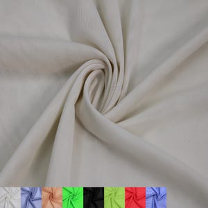 Tissu Power Mesh en dentelle poly-élasthanne de 60 po. de large par mètre (100 g/m²), léger, extensible dans les 4 sens, respirant. Ivoire n° 453