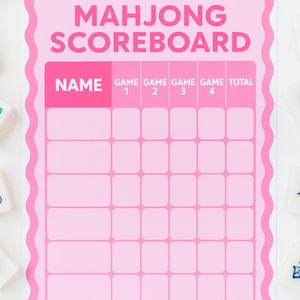 May include: A pink Mahjong Scoreboard with a scalloped border, featuring spaces for player names and game scores. The text "MAHJONG SCOREBOARD" is at the top. Mahjong tiles surround the board.