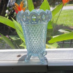 May include: A rustic wooden sign with the text "Welcome to our home" in white lettering. The sign features a distressed finish and a simple, inviting design, perfect for a front porch or entryway.