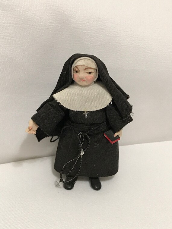 porcelain nun doll