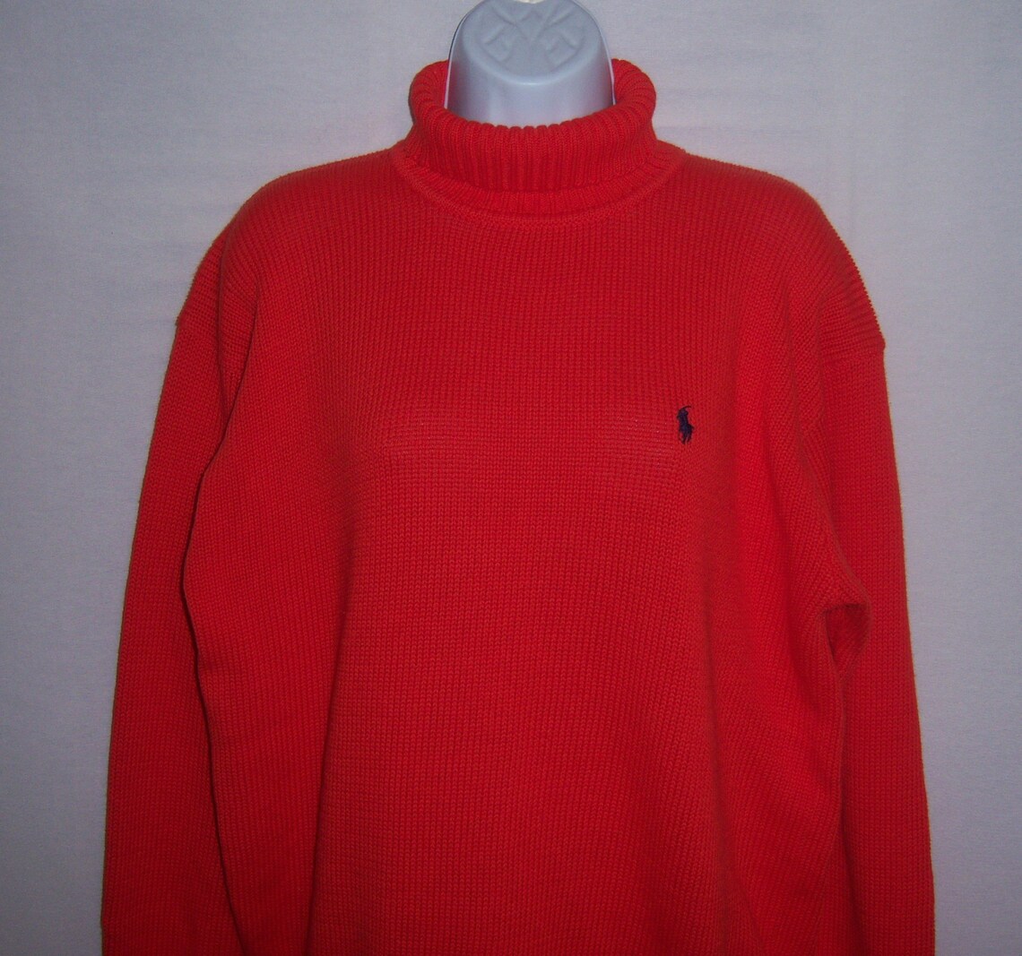 bright orange turtleneck