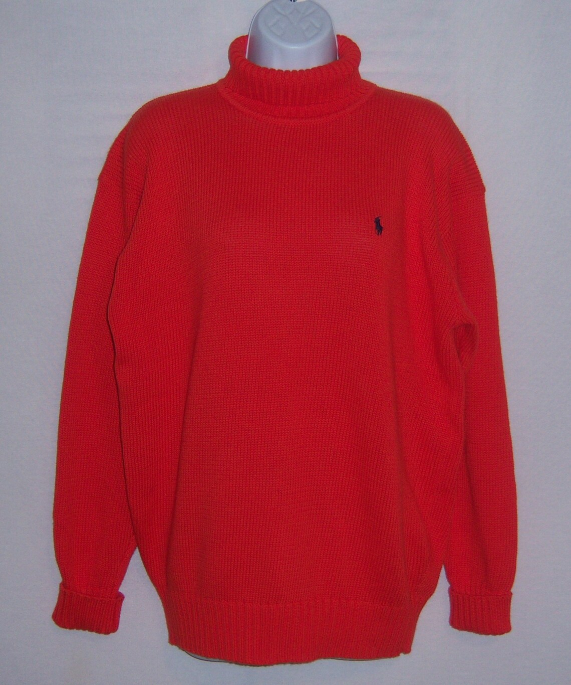 bright orange turtleneck