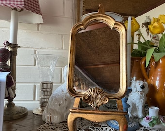 Miroir italien orné d'arche florentine en bois et or
