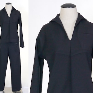 May include: A black sailor uniform with a long-sleeved shirt and matching pants.